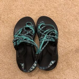 blue and black chacos